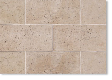Beige rectangular stone tile wall with light grout lines (brick-pattern).